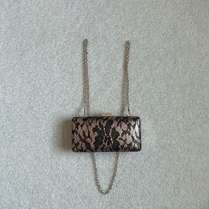 black and gold purse